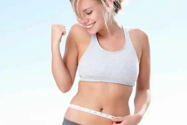 woman happy after fat reduction treatment Chadwell Heath