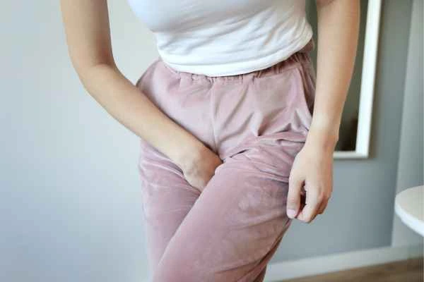 older woman running to the toilet because of urinary incontinence Chadwell Heath