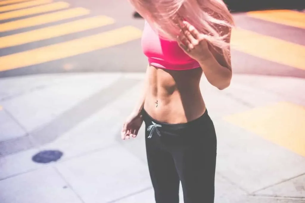 Woman with toned stomach after LA-EMS Body Sculpting Treatment Chadwell Heath